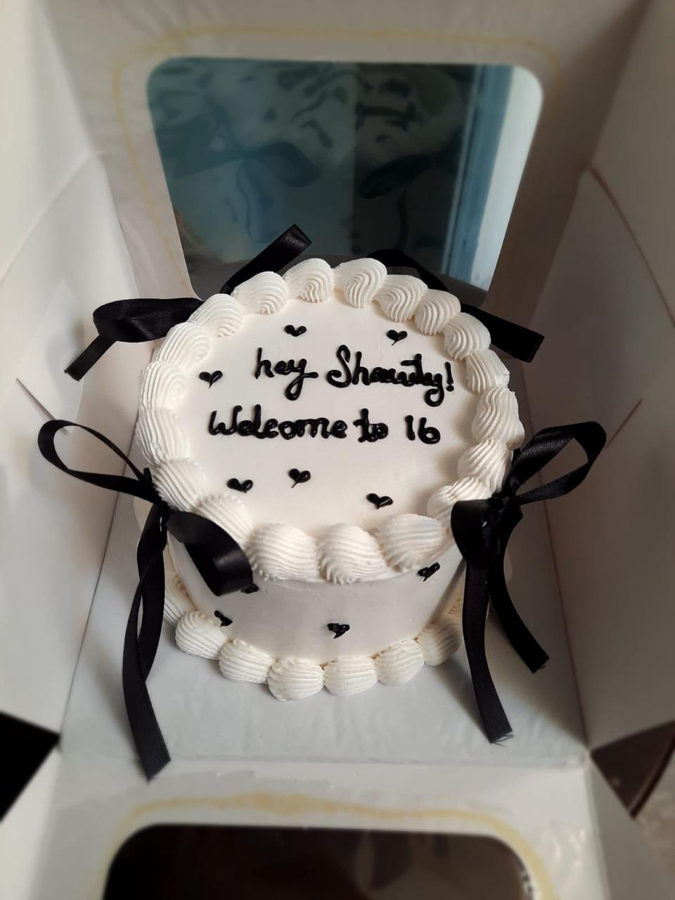 Black Ribbon Welcome Cake